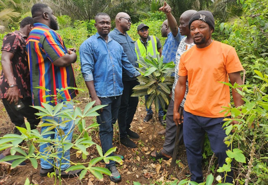 Menxons technical team and community members during field work in the Tikobo 1 project area